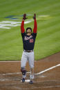 Washington Nationals' Juan Soto celebrates after his home run against Cincinnati Reds' Luis Castillo during the sixth inning of a baseball game Thursday, Sept. 23, 2021, in Cincinnati. (AP Photo/Jay LaPrete)