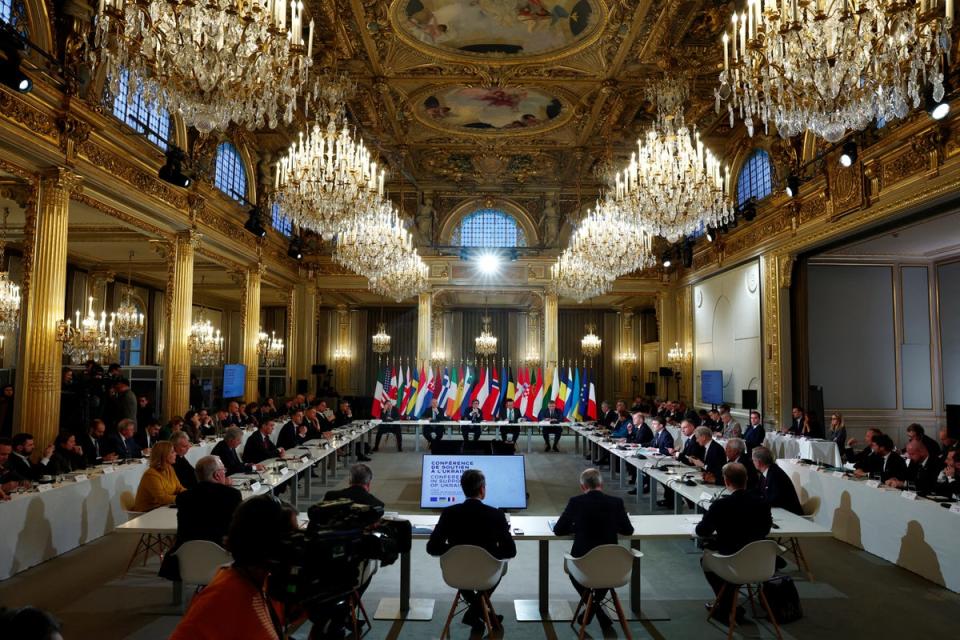 French president Emmanuel Macron delivers a speech to open a conference in support of Ukraine with European leaders in Paris on Monday 26 February (POOL/AFP via Getty Images)