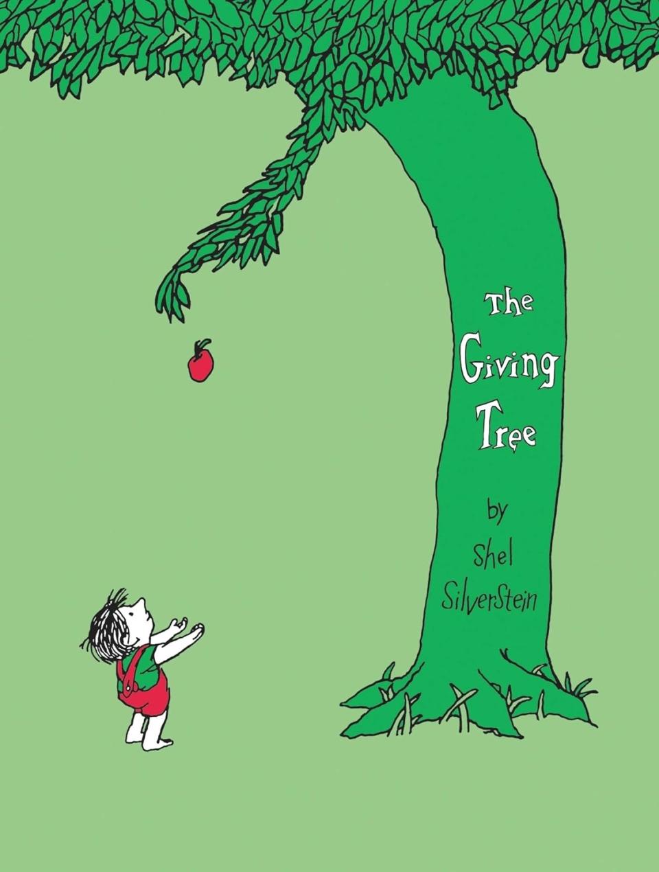 Cover of "The Giving Tree" by Shel Silverstein, showing a child reaching for an apple on a tree