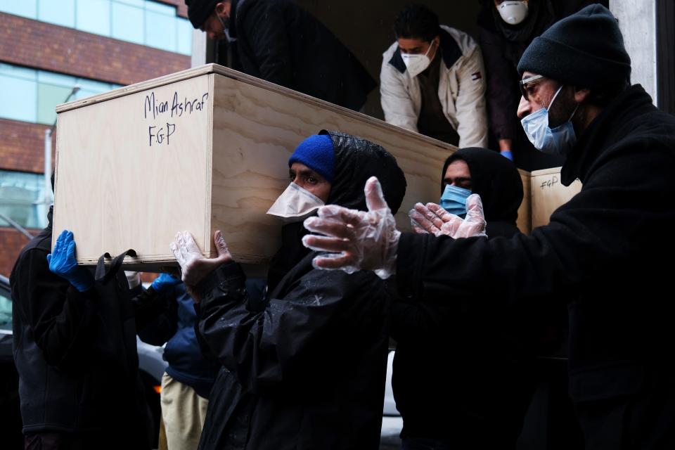 Caskets of Muslims who have passed away from the coronavirus are prepared for burial at a busy Brooklyn funeral home on the first day of Ramadan on April 24, 2020, in New York.