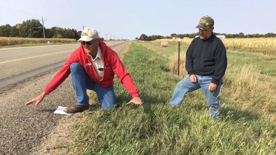 <div class="inline-image__caption"><p>Nick Nemec, in red, and his brother, Victor, at the site where their cousin Joe Boever was struck and killed by South Dakota Attorney General Jason Ravnsborg on Sept. 12. </p></div> <div class="inline-image__credit">Courtesy Tom Lawrence</div>