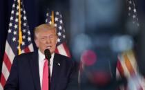 U.S. President Donald Trump speaks during a news conference at his golf resort in Bedminster