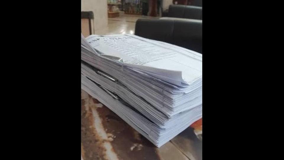The defense team for American Matthew J. Heath, accused in Venezuela of espionage and terrorism, said this stack of legal documents was dropped on them by the government two days before a scheduled June 17, 2021, hearing. His family said he was on a hunger strike in a Caracas jail until being allowed to see his lawyer that day.