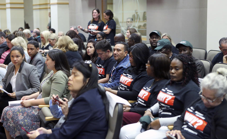 Parkland family members wait their turn to speak at a Senate Rules Committee meeting concerning Gov. Ron DeSantis' dismissal of Broward County Sheriff Scott Israel, Monday Oct. 21, 2019, in Tallahassee, Fla. (AP Photo/Steve Cannon)