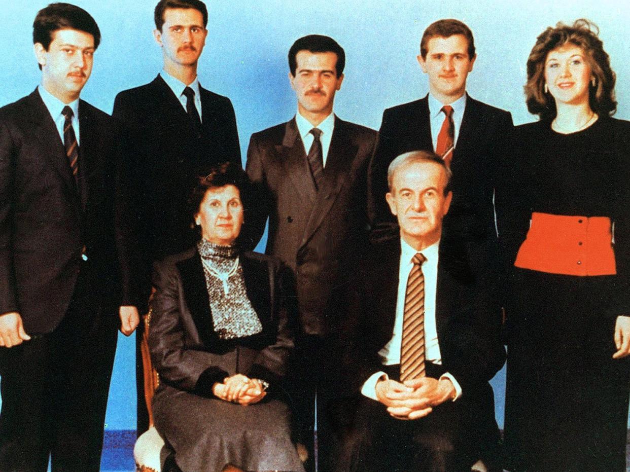 Family portrait: Bashar al-Assad (second from left) followed in his father's cruel methods: Getty/Beshara