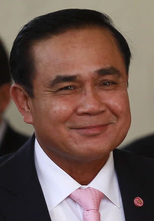 Thailand's Prime Minister Prayuth Chan-ocha smiles as he arrives at the Education Ministry in Bangkok, Thailand, May 21, 2015. REUTERS/Chaiwat Subprasom