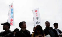 People wait for the arrival of Japan’s Emperor Naruhito to the Imperial Palace in Tokyo, Japan May 1, 2019. REUTERS/Kim Kyung-Hoon