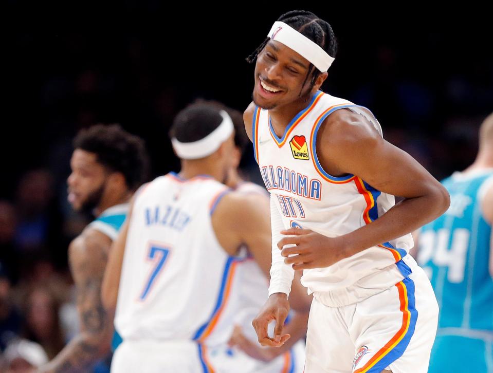 Oklahoma City's Shai Gilgeous-Alexander reacts after making a basket in March against Charlotte at Paycom Center.