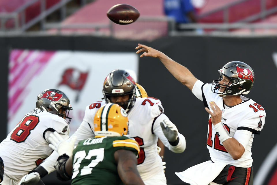 Tampa Bay Buccaneers quarterback Tom Brady (12) throws a pass against the Green Bay Packers during the second half of an NFL football game Sunday, Oct. 18, 2020, in Tampa, Fla. (AP Photo/Jason Behnken)