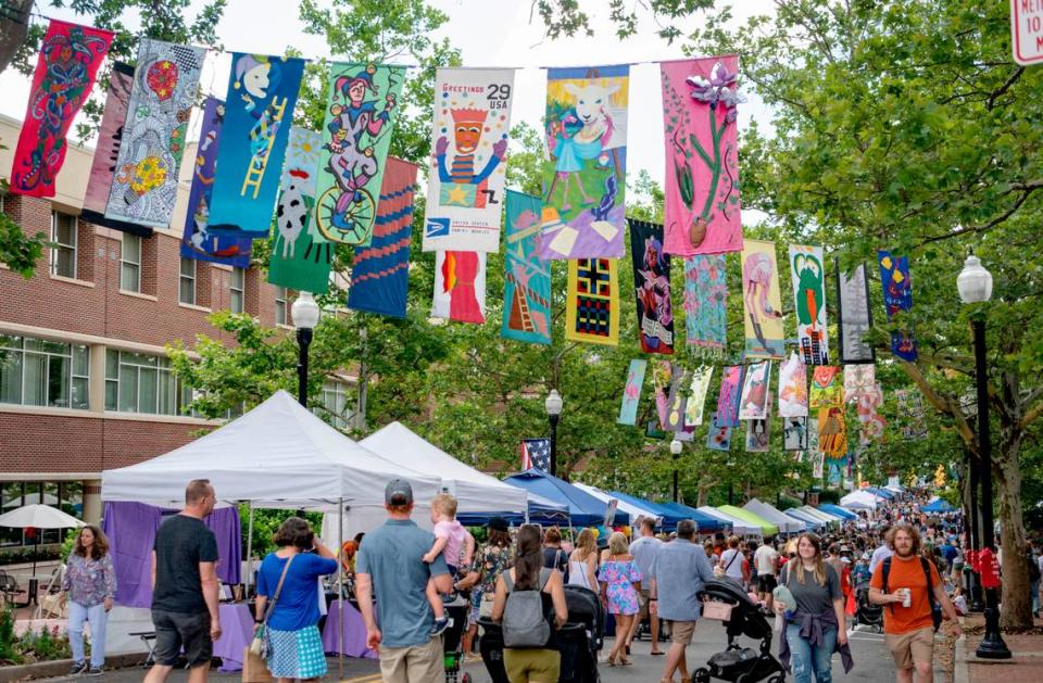 People fill Allen Street for Children and Youth Day at the Central Pennsylvania Festival of the Arts on Wednesday, July 13, 2022.