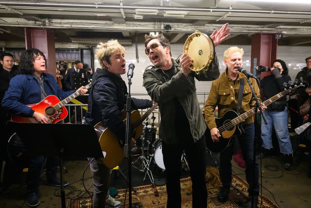 <p>Todd Owyoung/NBC via Getty</p> Green Day and Jimmy Fallon busk in the New York City subway on Jan. 18, 2024