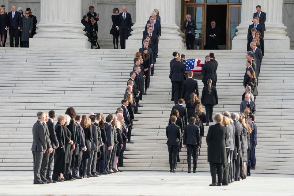 The casket of retired Supreme Court Justice Sandra Day O'Connor arrives at the United States Supreme Court in Washington, D.C., on Monday. O'Connor, the first woman to serve on the Supreme Court, died on Dec. 1.