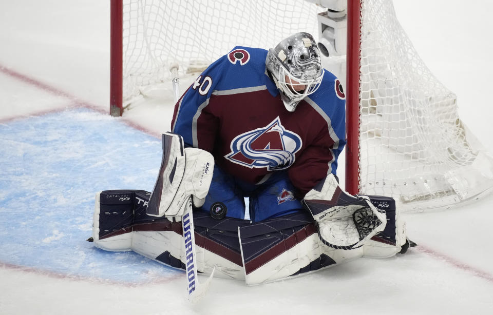 Colorado Avalanche goaltender Alexandar Georgiev stops a Vegas Golden Knights shot during the third period of an NHL hockey game Wednesday, Jan. 10, 2024, in Denver. (AP Photo/David Zalubowski)