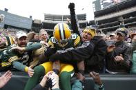 James Jones #89 of the Green Bay Packers celebrates with fans after a 32-yard touchdown reception against the Minnesota Vikings during the first half of the game at Lambeau Field on December 2, 2012 in Green Bay, Wisconsin. (Photo by Joe Robbins/Getty Images)