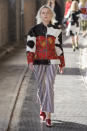 <p><i>A model wears a patchwork cow- and floral-printed moto jacket. (Photo: ImaxTree) </i></p>