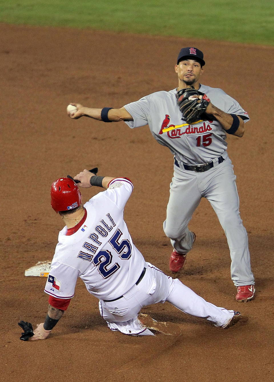 ARLINGTON, TX - OCTOBER 23: Rafael Furcal #15 of the St. Louis Cardinals turns the double play as Mike Napoli #25 of the Texas Rangers slides into second base in the eighth inning during Game Four of the MLB World Series at Rangers Ballpark in Arlington on October 23, 2011 in Arlington, Texas. (Photo by Doug Pensinger/Getty Images)