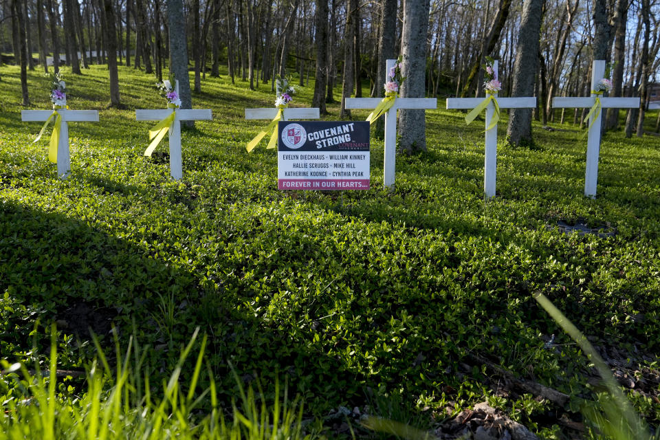 A roadside memorial is seen near the Covenant School on the one-year anniversary of a mass shooting Wednesday, March 27, 2024, in Nashville, Tenn. The shooter, a former Covenant School student, killed three children and three staff members during the incident. (AP Photo/George Walker IV)