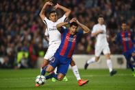 <p>Luis Suarez of Barcelona is challenged by Marquinhos of PSG for a penalty during the UEFA Champions League Round of 16 second leg match between FC Barcelona and Paris Saint-Germain at Camp Nou on March 8, 2017 in Barcelona, Spain. (Photo by Laurence Griffiths/Getty Images) </p>