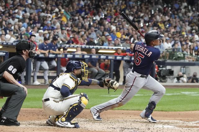 MILWAUKEE, WI - JUNE 08: Milwaukee Brewers shortstop Luis Urias (2) throws  to first during a game between the Milwaukee Brewers and the Philadelphia  Phillies on June 8, 2022 at American Family