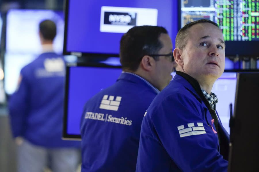 Traders work on the floor at the New York Stock Exchange in New York, Wednesday, May 3, 2023. Stocks are drifting higher in early trading ahead of what Wall Street hopes will be the last hike to interest rates for a long time. (AP Photo/Seth Wenig)