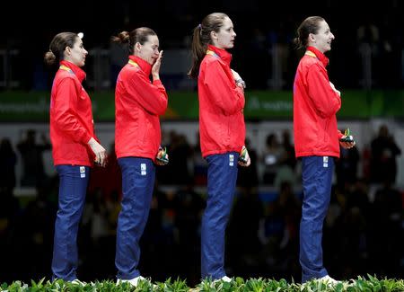 2016 Rio Olympics - Fencing - Victory Ceremony - Women's Epee Team Victory Ceremony - Carioca Arena 3 - Rio de Janeiro, Brazil - 11/08/2016. Romania celebrates winning the gold medal. REUTERS/Sergio Moraes