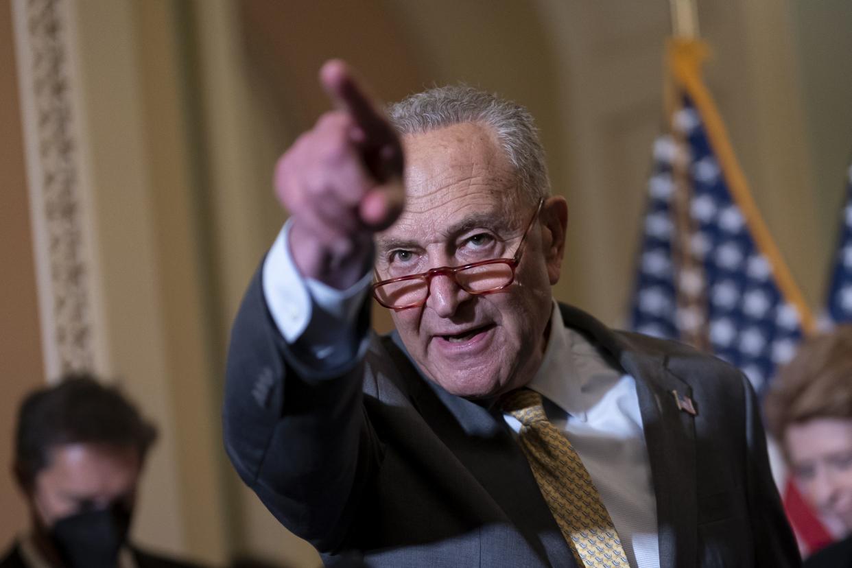 Senate Majority Leader Chuck Schumer, D-N.Y., speaks with reporters following a closed-door policy lunch, at the Capitol in Washington, Tuesday, June 14, 2022. 