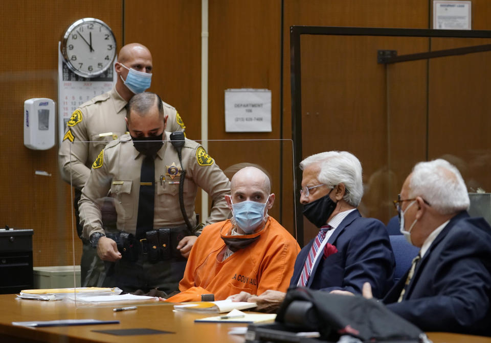 Michael Thomas Gargiulo, left, listens to his defense attorneys Daniel Nardoni, middle, and Dale Michael Rubin, right, during his sentencing hearing at Los Angeles Superior Court, Friday, July 16, 2021. A judge denied a new trial for Garigiulo, a man prosecutors called “The Boy Next Door Killer,” who could be sentenced to death later Friday for the home-invasion murders of two women and the attempted murder of a third. (AP Photo/Damian Dovarganes)
