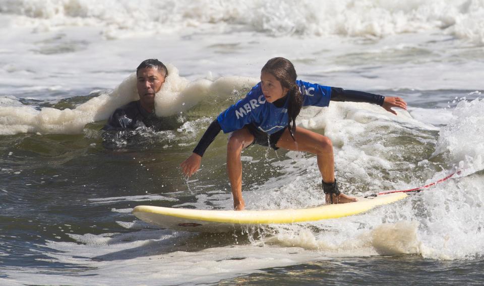 As part of the Manasquan Boardriders Club’s “Weekend of Surfing”, young surfers got to compete on Saturday. Young surfers competed in different age brackets throughout Saturday. On Sunday, the club hold it’s 28th Annual Classic Longboard Contest.