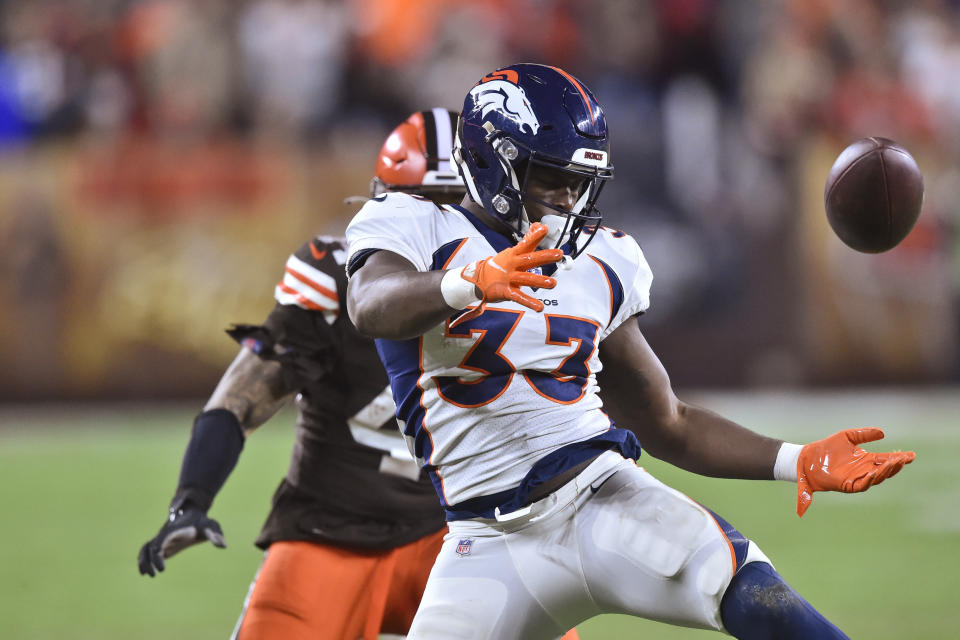 Denver Broncos running back Javonte Williams (33) drops a pass during the second half of the team's NFL football game against the Cleveland Browns, Thursday, Oct. 21, 2021, in Cleveland. (AP Photo/David Richard)