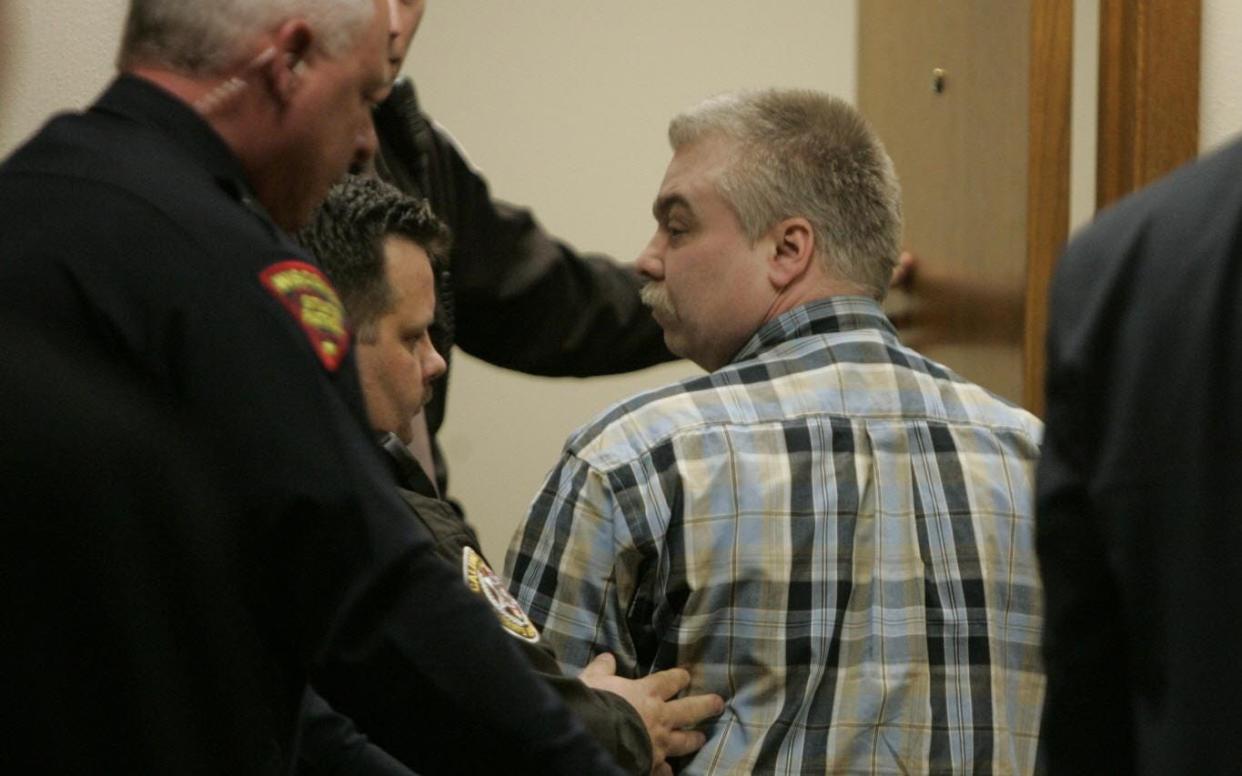 Steven Avery is escorted out of a courtroom in the Calumet County Courthouse Sunday, March 18, 2007.