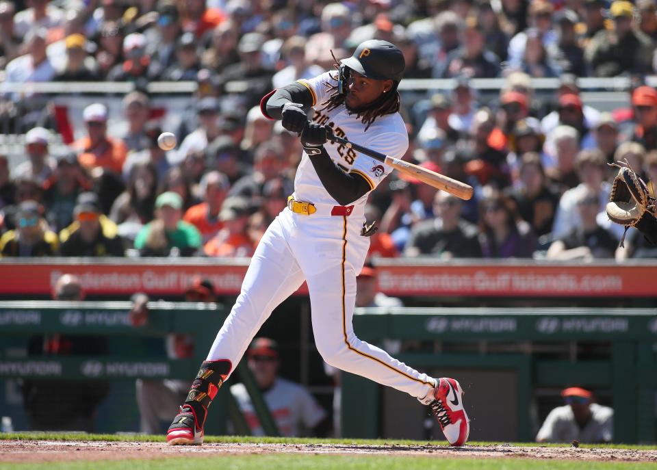 Pittsburgh Pirates shortstop Oneil Cruz (15) swings at a pitch delivered by Baltimore Orioles pitcher Dean Kremer during the third inning Sunday afternoon at PNC Park in Pittsburgh, PA.