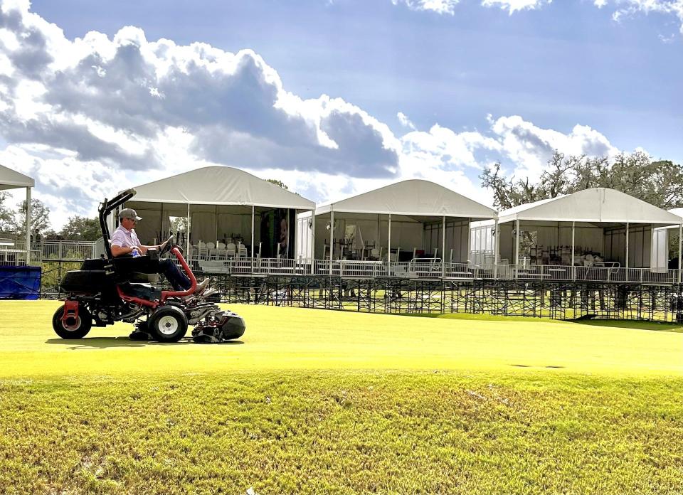 A Timuquana Country Club agronomy staff member mows the 18th green on Sept. 27 in preparation for the PGA Tour Champions Furyk & Friends golf tournament Oct. 4-6. Damage from the First Coast's close brush with Hurricane Helene was minor.