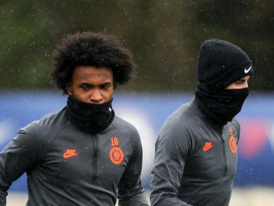 Willian and Jorginho train ahead of the Champions League last 16 tie: Getty