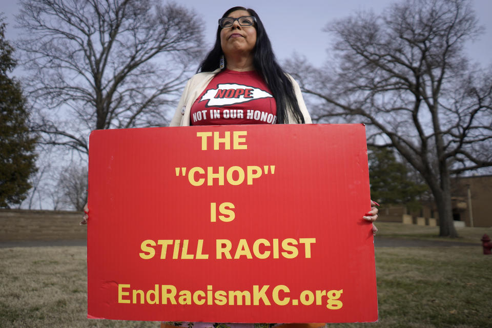 Rhonda LeValdo poses Tuesday, Feb. 6, 2024, in Lawrence, Kan. The Kansas City Chiefs, her hometown team and the focus of her protest, are playing in the Super Bowl this weekend. Levaldo is renewing her call for the team to change its name and ditch its logo and gametime rituals that she and other activists say are offensive. (AP Photo/Ed Zurga)