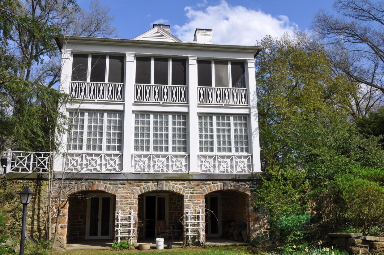 The former Morgan mansion has a lot of cool features, including a two-story porch that overlooks a courtyard in Alliance.