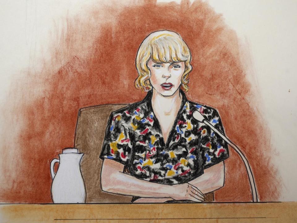 In this courtroom sketch, pop singer Taylor Swift speaks from the witness stand during (AP)