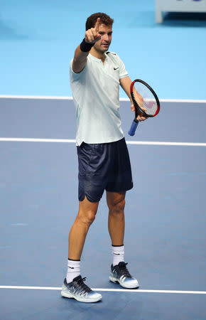 Tennis - ATP World Tour Finals - The O2 Arena, London, Britain - November 13, 2017 Bulgaria’s Grigor Dimitrov celebrates winning his group stage match against Austria’s Dominic Thiem REUTERS/Hannah McKay