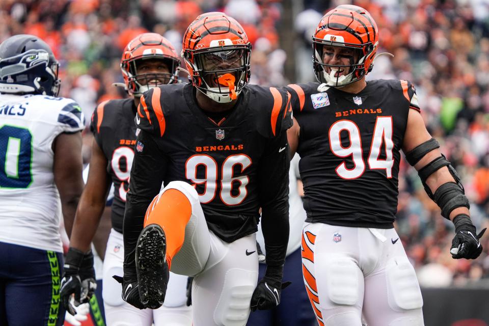 Cincinnati Bengals Cam Sample (96) celebrates after a successful play during their game against the Seattle Seahawks at Paycor Stadium on Sunday October 15, 2023. Bengals were up 14-10 at halftime.