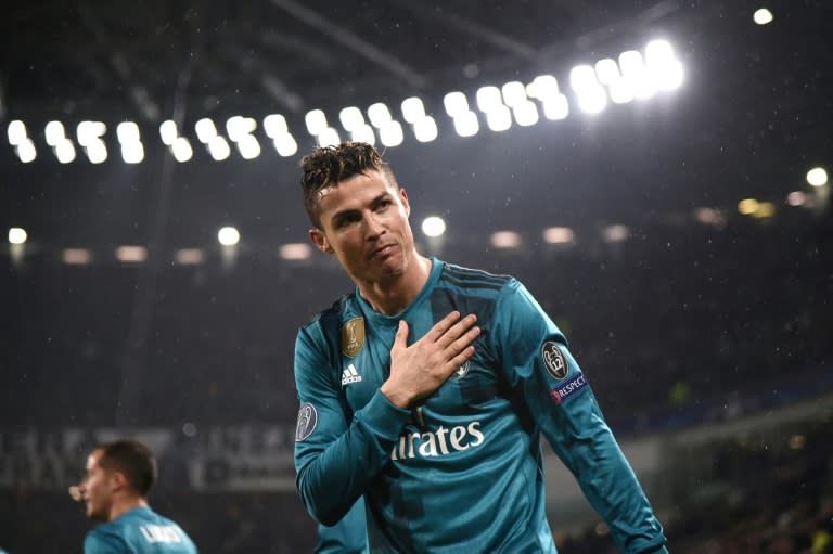 Hand on heart: Cristiano Ronaldo acknowledges the ovation from Juventus fans after his stunning second goal