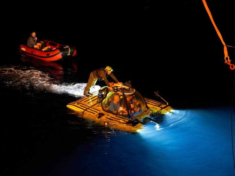 Crew make emergency ascent after fire on British research submarine