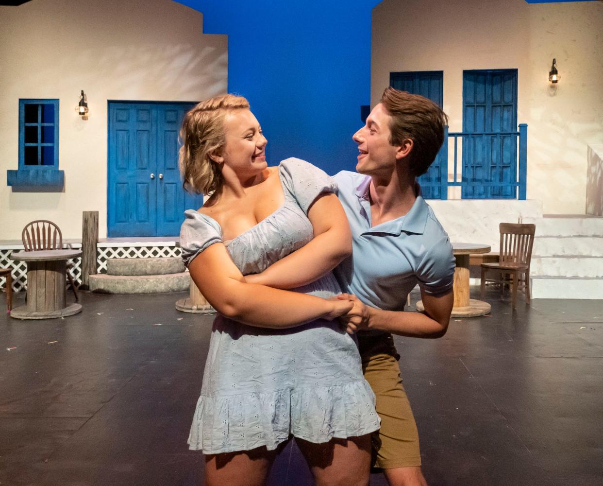 Reagan Branch (left) and Sam Allen in Theatre Tuscaloosa's production of "Mamma Mia!," running July 15-24 in the Bean-Brown Theatre. [Photo by Porfirio Solórzano]