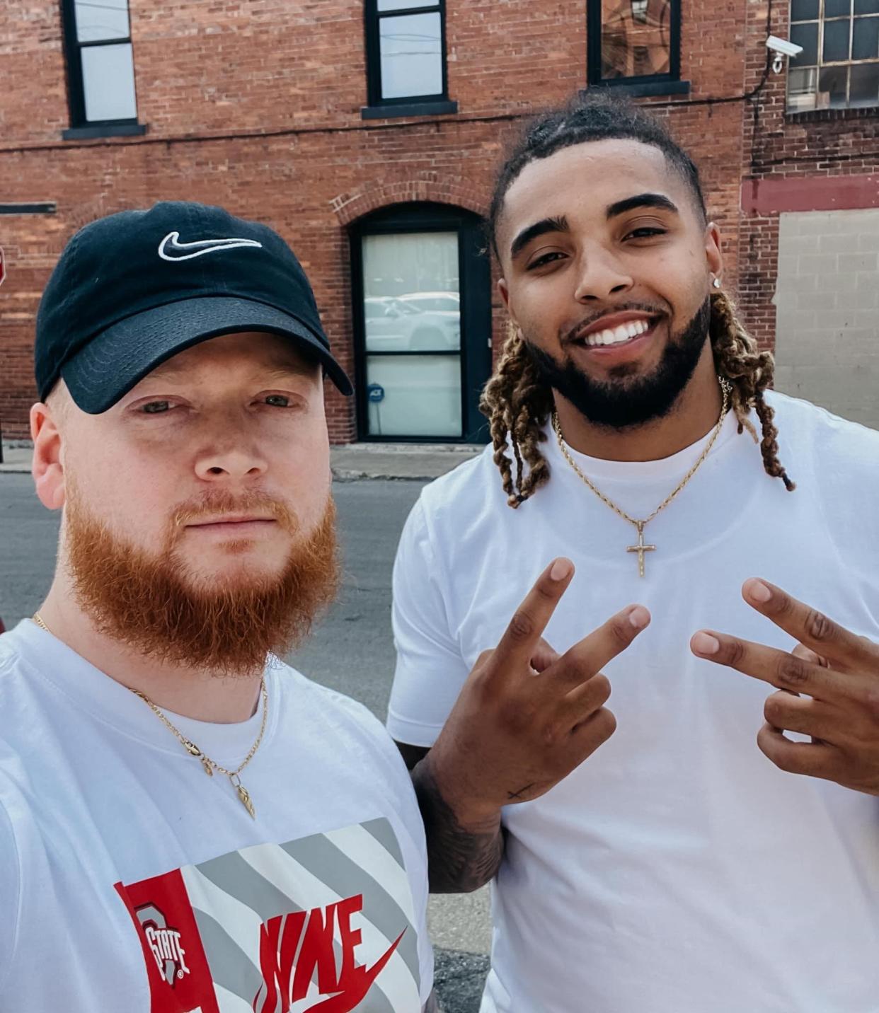 Marion resident Trey Crampton, left, is now the official videographer for Ohio State football player Gee Scott Jr., right. Crampton is working with Scott to provide video content for the Buckeye tight end's social media accounts and NIL interests. Crampton owns and operates Trey Films Media LLC.