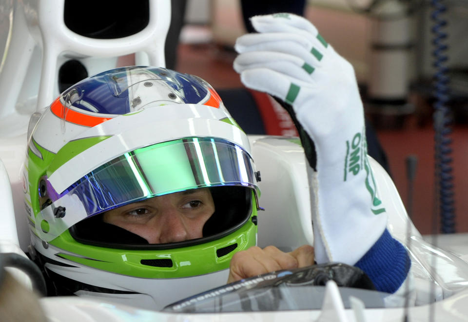 Simona De Silvestro, of Switzerland, sits in the cockpit of a Sauber F1 2012 during a training session at Ferrari's Fiorano test track, near Modena, Italy, Saturday, April 26, 2014. Simona de Silvestro is an affiliated driver with Sauber this year with a goal of competing for a Formula One seat in 2015. The Swiss driver has spent the last four years racing in IndyCar, and scored her first career podium in October with a second-place finish at Houston. It was the first podium finish for a woman on a road course in IndyCar. The 25-year-old De Silvestro has been spending this year testing, participating in simulator training and preparing for the mental and physical demands of F1. Sauber says the goal is to help De Silvestro earn her F1 super license and prepare for a seat in 2015. (AP Photo/Marco Vasini)