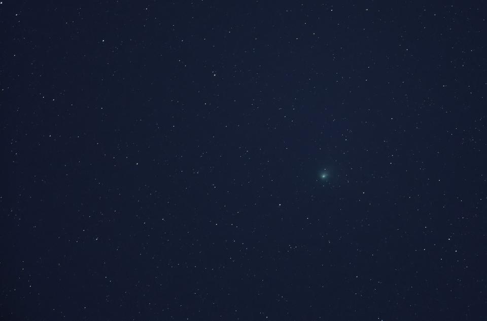 Comet C/2022 E3 (ZTF) is visible in the sky above the Mojave National Preserve in San Bernadino County as it approaches Earth for the first time in about 50,000 years on January 31, 2023 near Baker, California. The comet was discovered on March 2, 2022, and will be at its closest point to Earth on February 1, 2023. Its orbit extends far out into our solar system and has a green aura because it is passing close enough to the sun for the outgassing of its diatomic carbon molecules to react with the solar wind. (Getty Images)