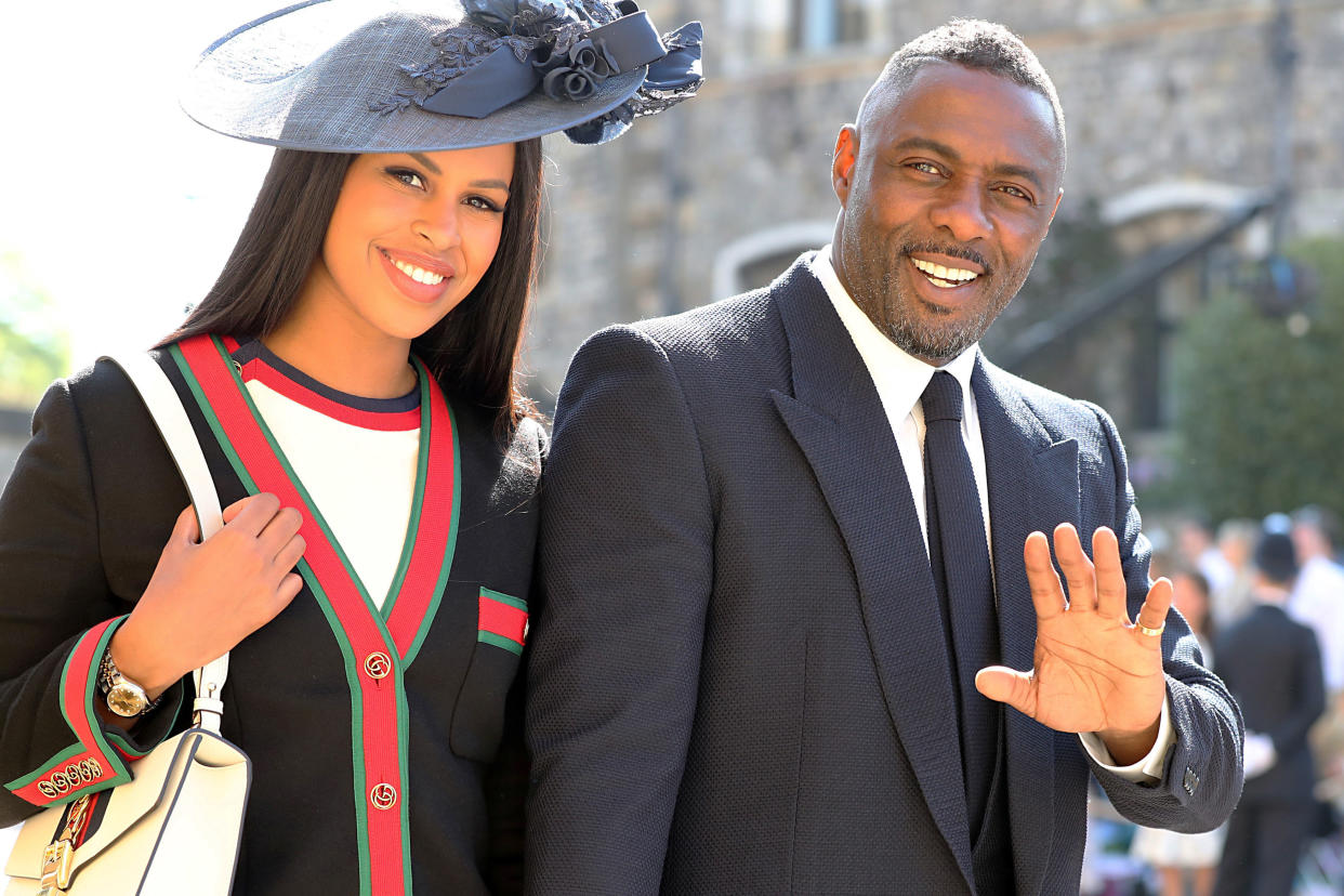 WINDSOR, UNITED KINGDOM - MAY 19:  Idris Elba and Sabrina Dhowre arrive at St George's Chapel at Windsor Castle before the wedding of Prince Harry to Meghan Markle on May 19, 2018 in Windsor, England. (Photo by Gareth Fuller - WPA Pool/Getty Images)