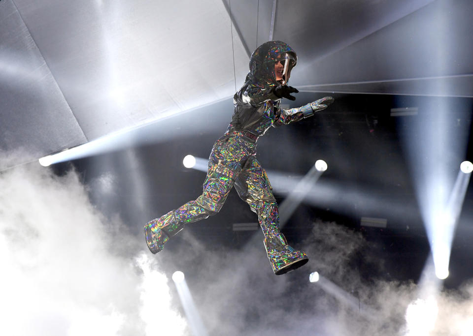 <p>Host Katy Perry flies in to land on the stage during the VMAs. (Photo: Kevin Winter/Getty Images) </p>