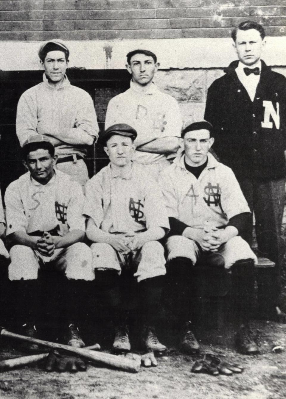 Three Greines brothers were in North Side High’s 1913 baseball lineup: Dave stands at far right. Seated are Abe at far right and Sol, third from right.