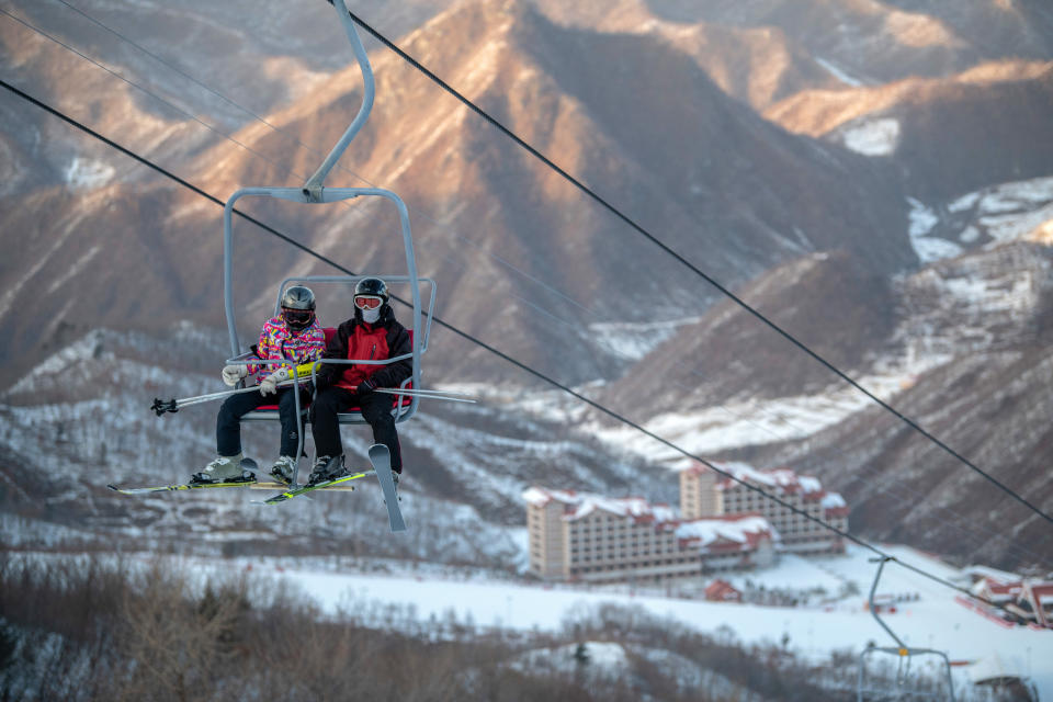 Skiers ride a lift at Masikryong Ski Resort on Feb. 4, near Wonsan, North Korea.