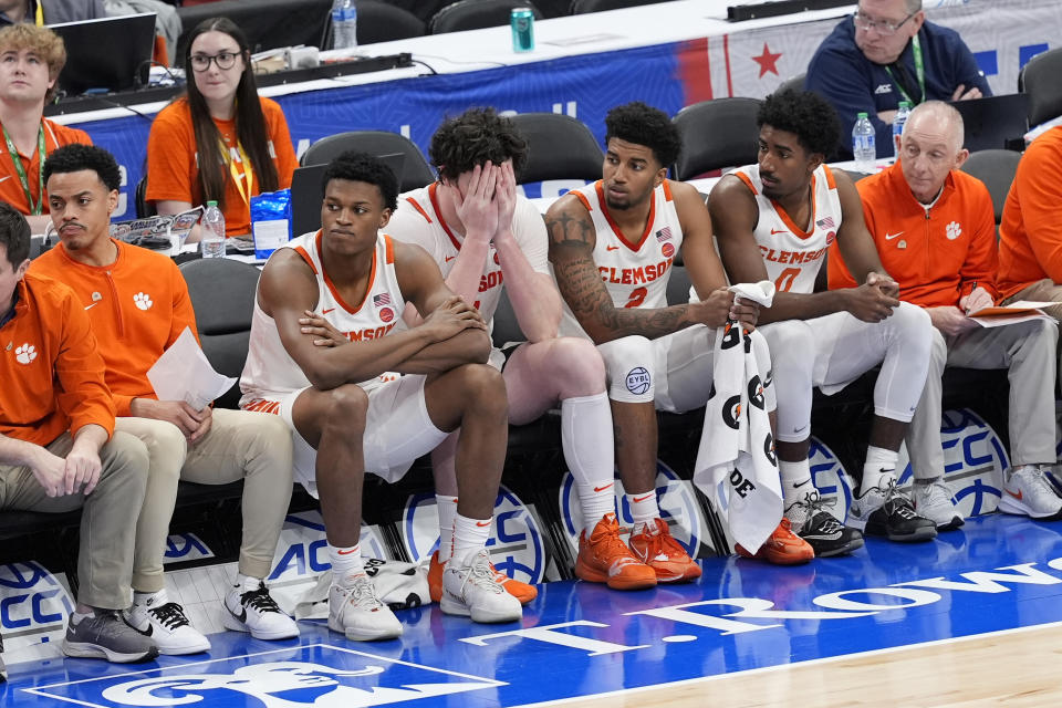 Clemson players sit on the bench near the end of the second half of the Atlantic Coast Conference NCAA college basketball tournament after their lost to Boston College, Wednesday, March 13, 2024, in Washington. Boston College won 76-55. (AP Photo/Susan Walsh)