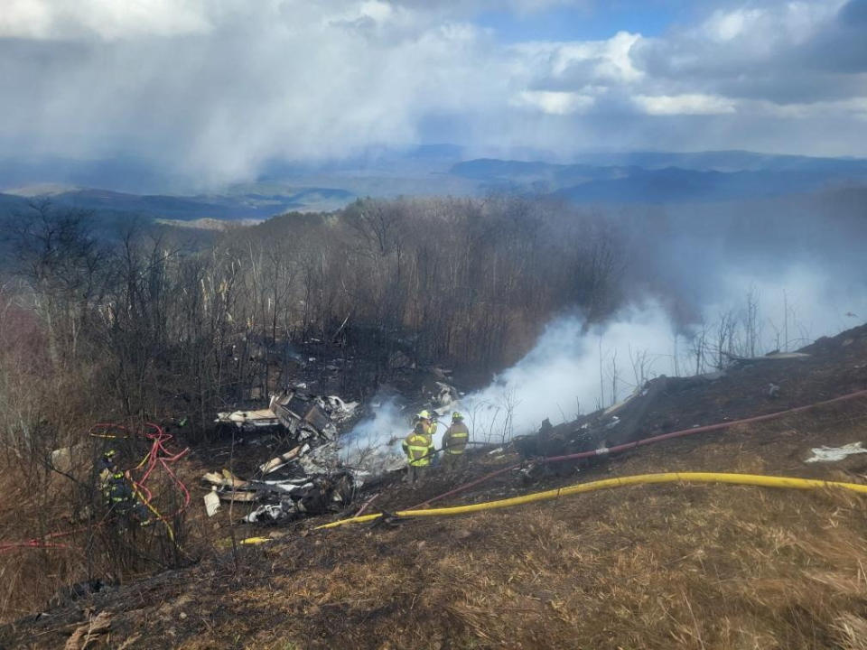 Emergency crew work at the site of a business jet crash in Hot Springs, Bath County, Virginia, U.S. March 10, 2024. The Recorder, Austin Hall/Handout via REUTERS THIS IMAGE HAS BEEN SUPPLIED BY A THIRD PARTY. NO RESALES. NO ARCHIVES. MANDATORY CREDIT